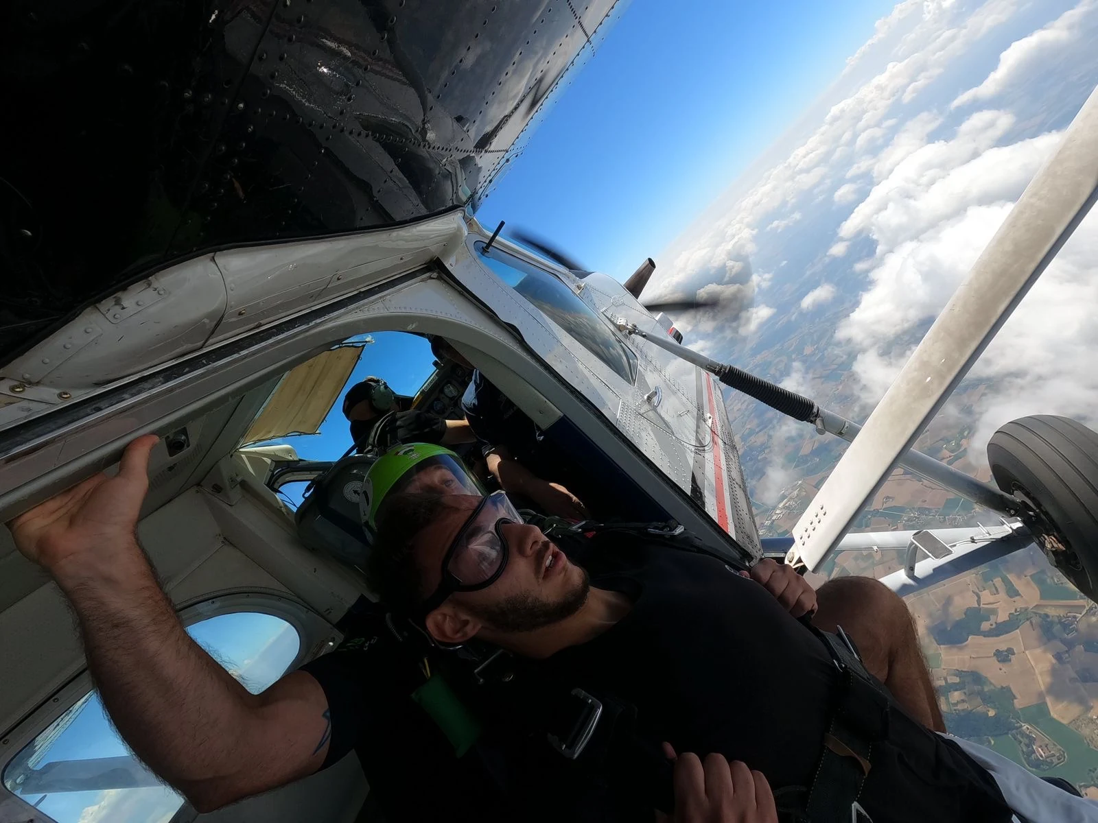 Skydiving — at the aircraft door before a tandem jump
