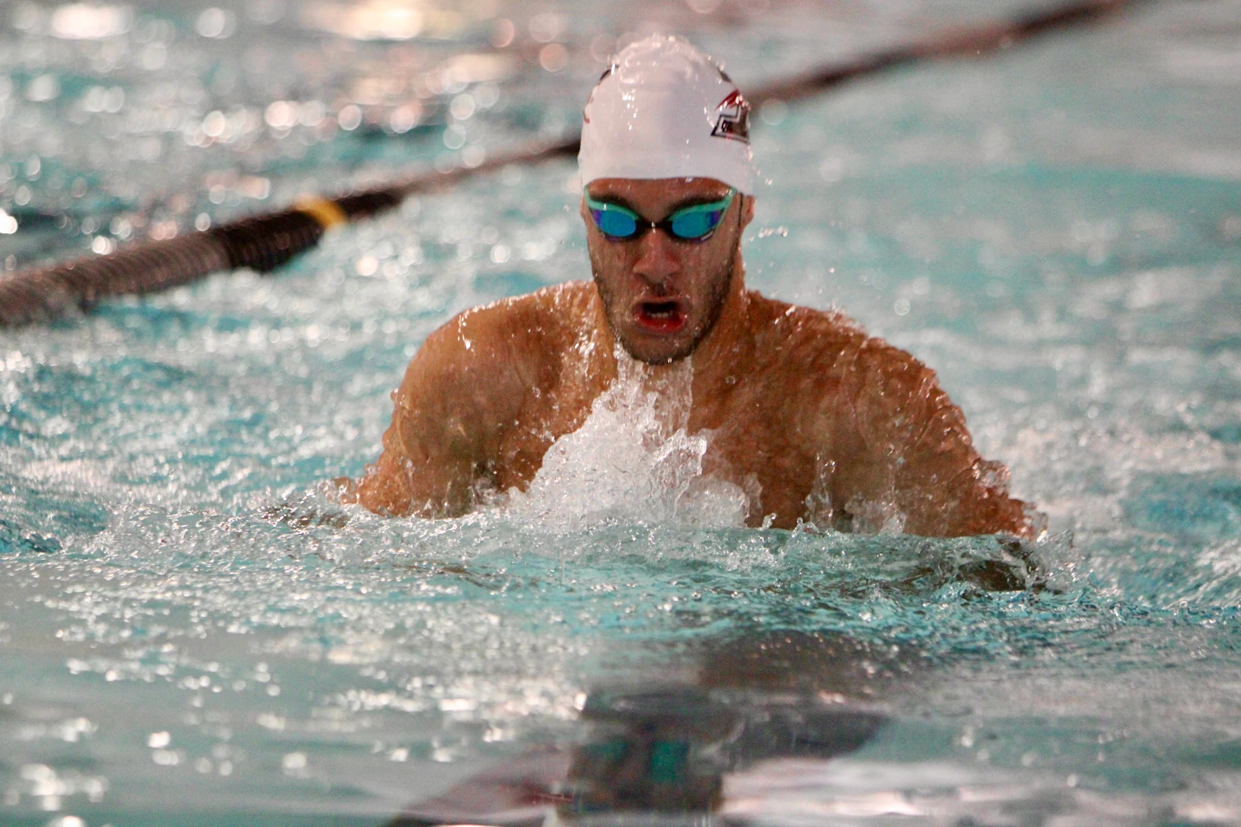 Swimming — racing breaststroke through the pool